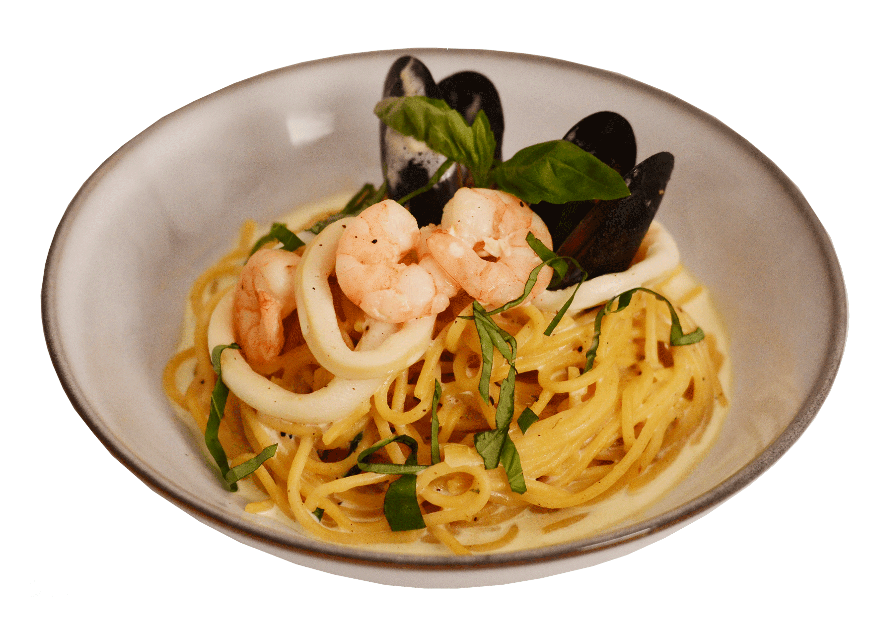idocatering agarlic creamy seafood pasta served on white plate 